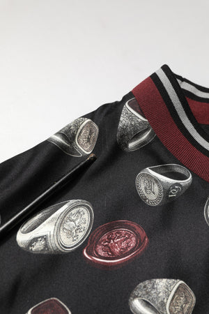 Dolce & Gabbana Schwarzer Sweatshirt mit Ring-Print Rundhalsausschnitt Pullover