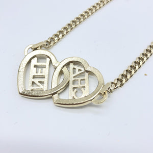 Chanel Goldfarbene Herz-Choker-Halskette mit Logo