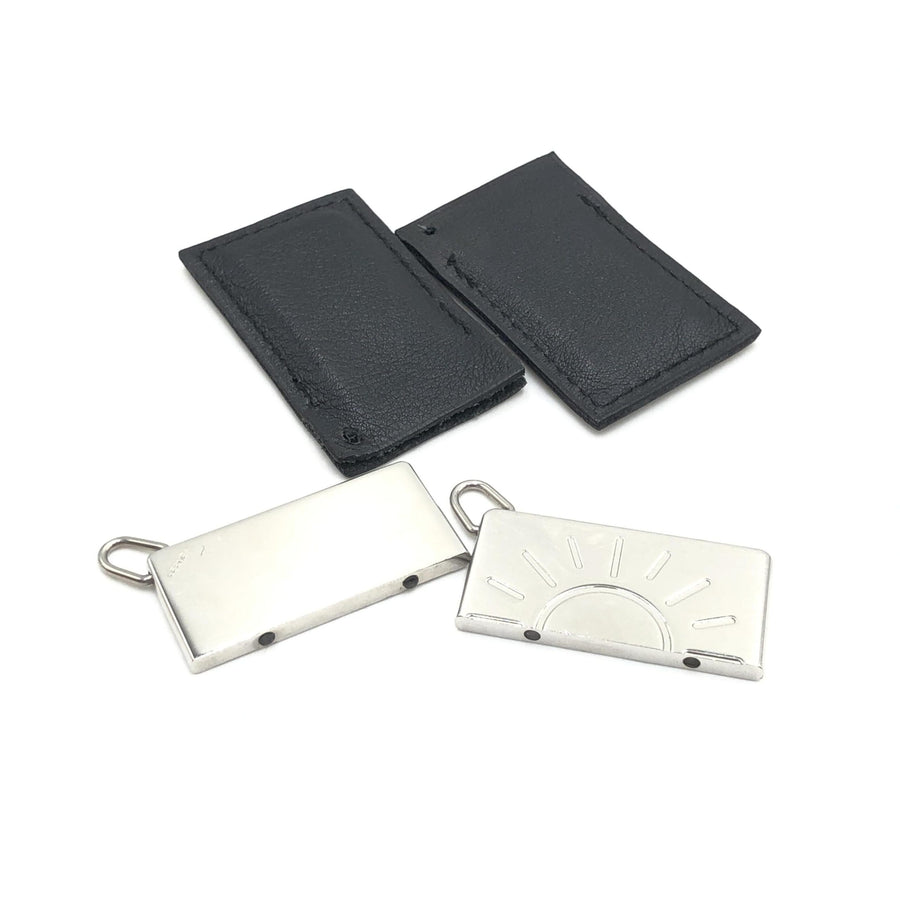 Hermès Silberfarbenes Halbsonnen-Anhänger-Set