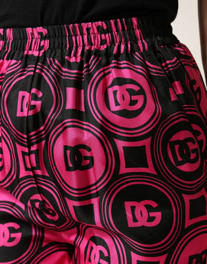 Dolce & Gabbana Schwarze Fuchsia-Seiden-Shorts mit Logo-Bund