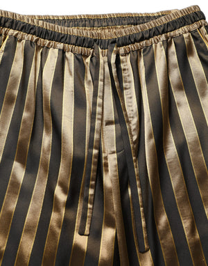 Dolce & Gabbana Herrenhose mit Gold-Schwarz-Streifen und schmal zulaufendem Bein aus Satin