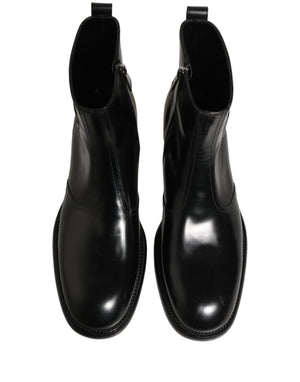Dolce & Gabbana Schwarze Leder-Stiefeletten mit geprägtem Logo