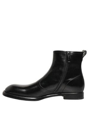 Dolce & Gabbana Schwarze Leder-Stiefeletten mit geprägtem Logo