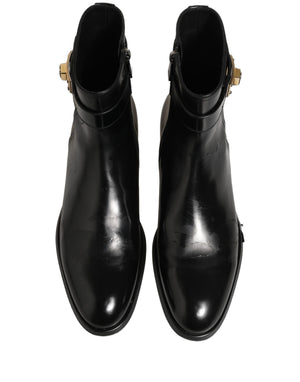 Dolce & Gabbana Schwarze Lederstiefel mit Logo-Schnalle, mittelhoher Schaft