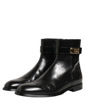 Dolce & Gabbana Schwarze Lederstiefel mit Logo-Schnalle, mittelhoher Schaft