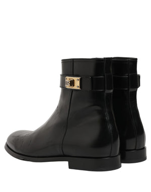 Dolce & Gabbana Schwarze Lederstiefel mit Logo-Schnalle, mittelhoher Schaft