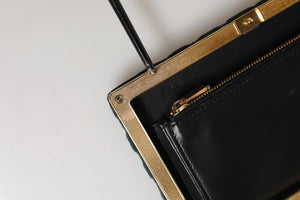 Dolce & Gabbana Schwarze Samt-Clutch mit Goldrahmen Abendtasche