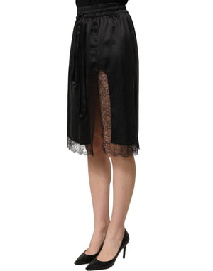 Dolce & Gabbana Schwarzer Satinrock mit Spitzendetails und seitlichem Schlitz