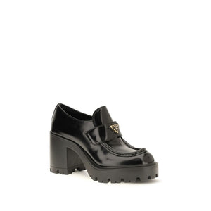 Prada Schwarze Bos Taurus Kalbsleder Plateau-Loafer