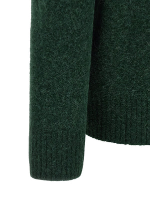 Ami Paris Zweifarbige Polo-Shirt aus Alpakawolle und Leder
