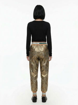 Dolce & Gabbana Leggings aus goldfarbenem Metallic-Garn