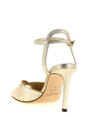 Jimmy Choo Sandale mit Stilettoabsatz aus Kalbsleder Bos Taurus in Gold