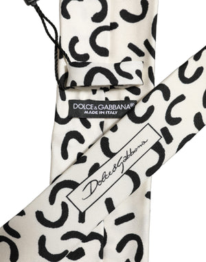 Dolce & Gabbana Herren Krawatte aus Seide in Creme mit abstraktem Muster und Bindebefestigung