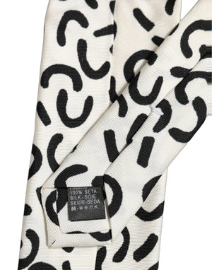 Dolce & Gabbana Herren Krawatte aus Seide in Creme mit abstraktem Muster und Bindebefestigung