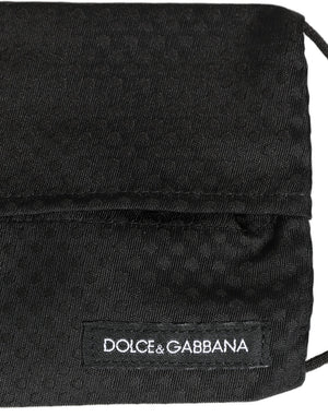 Dolce & Gabbana Schwarze Seiden-Maske mit Muster, Plisseefalten und elastischem Ohrband