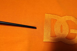 Dolce & Gabbana Orangefarbenes Logo-T-Shirt mit Rundhalsausschnitt aus Baumwolle