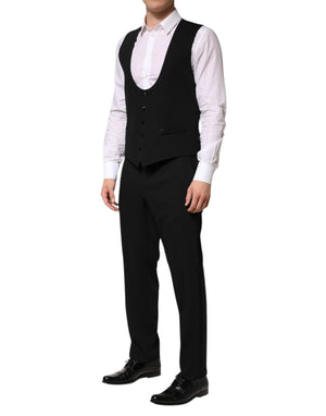 Dolce & Gabbana Schwarzer einreihiger Anzug aus Wolle (3 Teile)