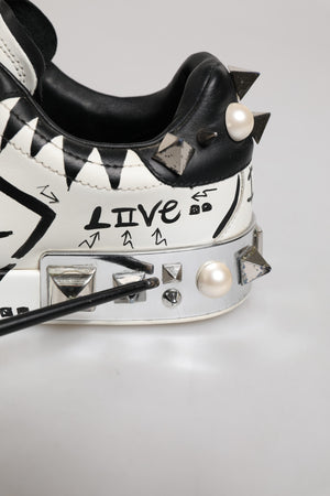 Dolce & Gabbana Schwarze und weiße Low-Top-Sneaker mit Nieten