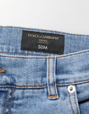 Dolce & Gabbana Blaue zerrissene Slim Fit Jeans aus Baumwolldenim