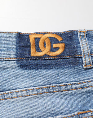 Dolce & Gabbana Blaue zerrissene Slim Fit Jeans aus Baumwolldenim